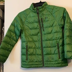Green REI puffer jacket winter-weight.